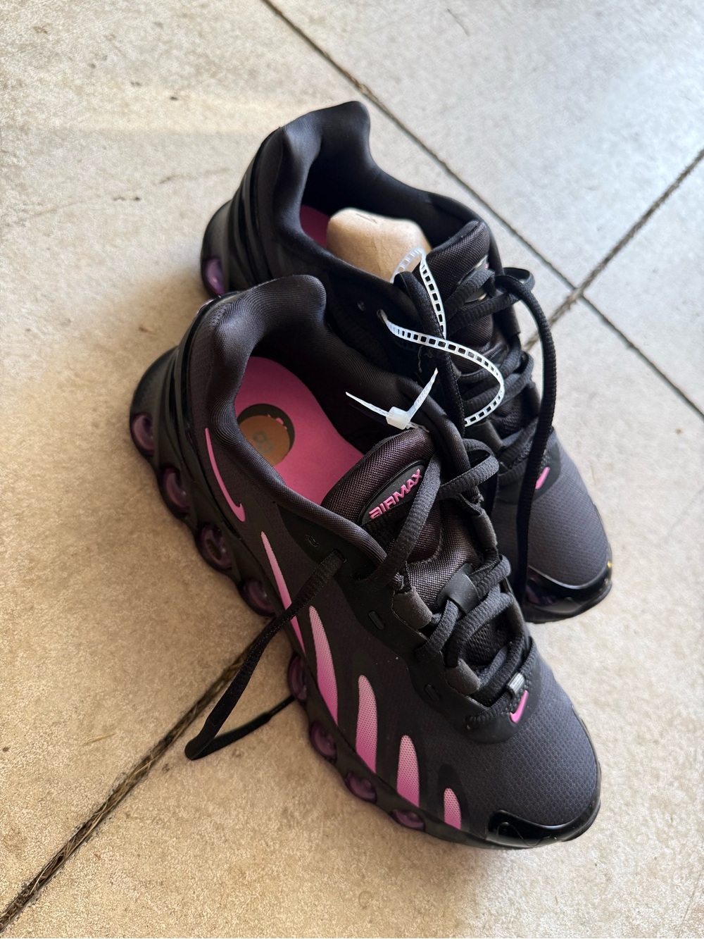 Nike Black and Pink Air Max shoes